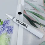 11-kevu-smile-whitening-pen-flat-lay-on-magazine