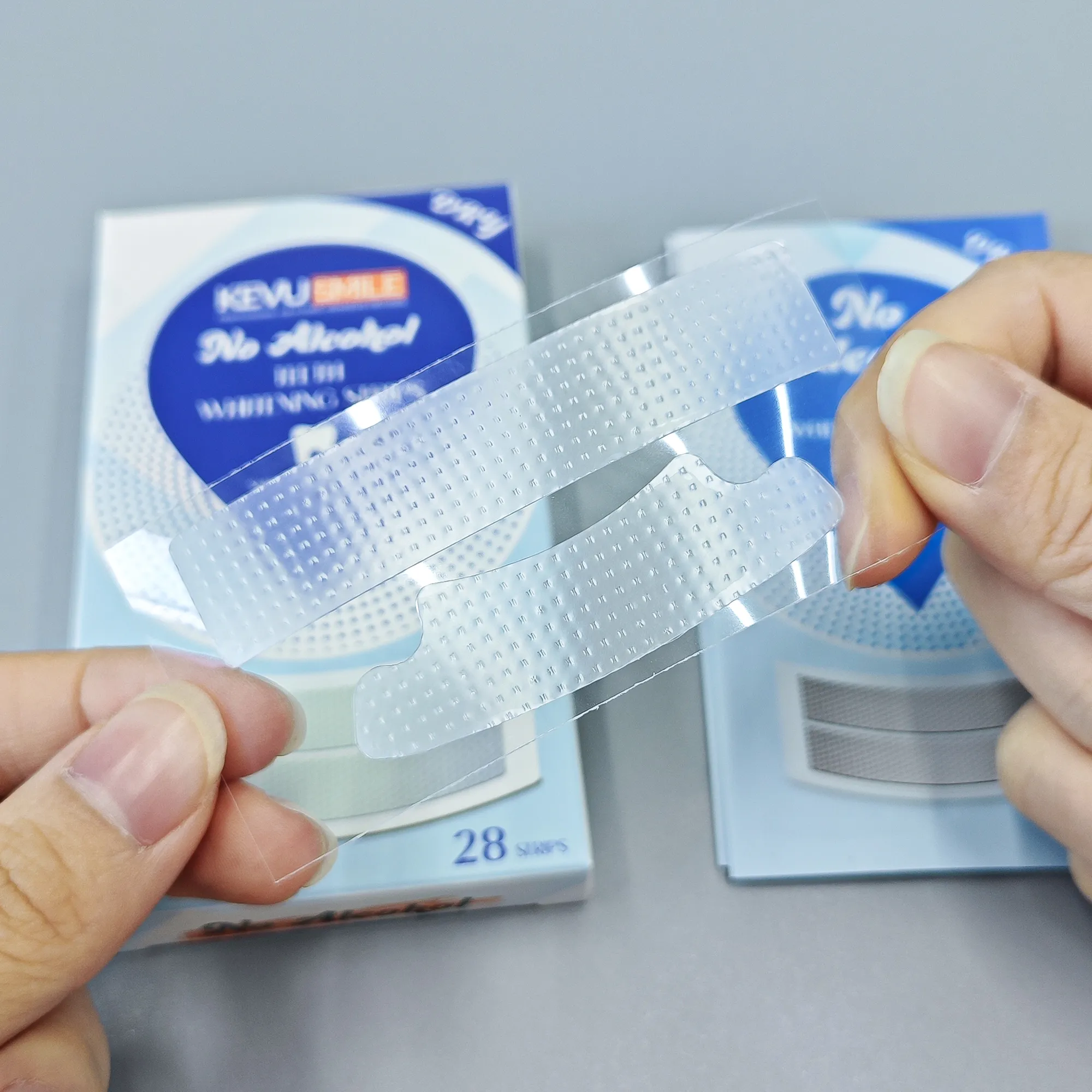 14-kevu-smile-strips-closeup-hand