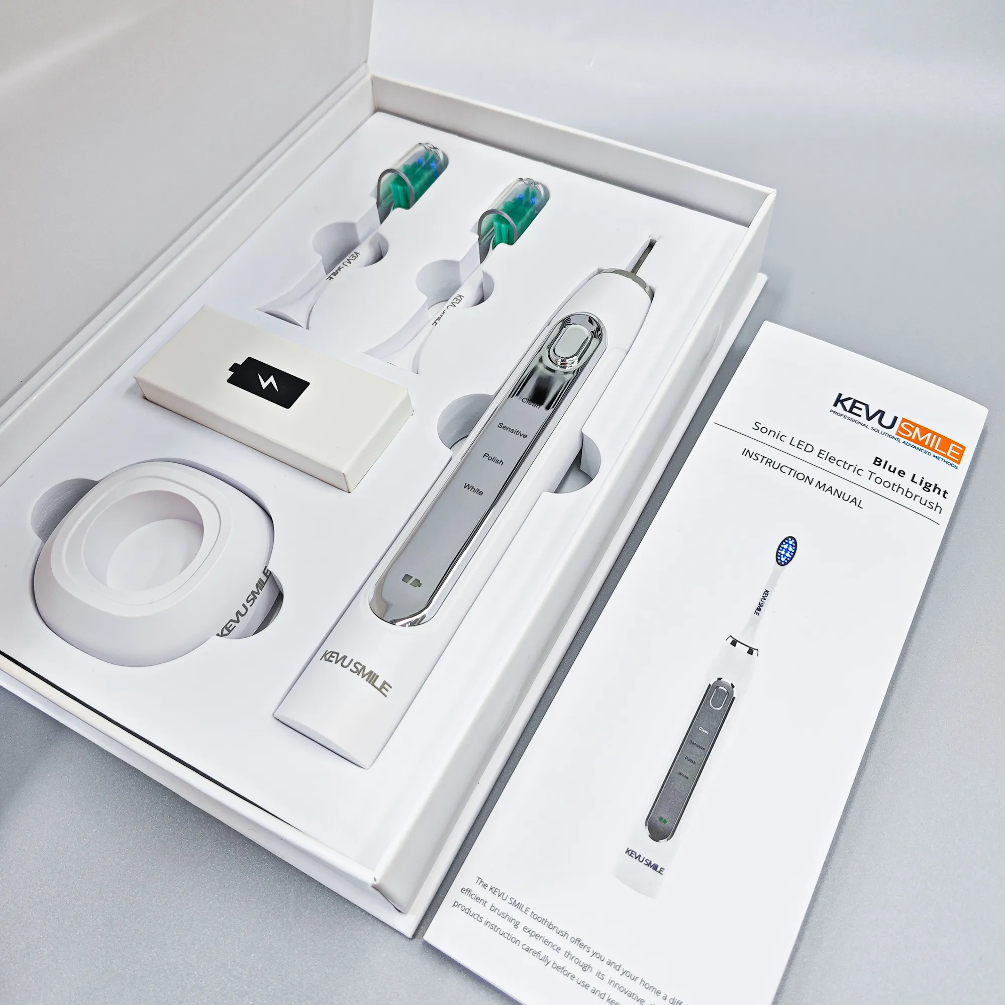 4-kevu-smile-model-holding-electric-toothbrush